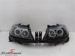 C54103  Headlight set H7 clear glass/black, with angel eyes rings+white indicators
