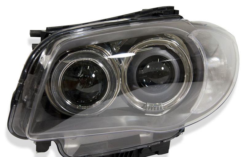 Strålkastare D1S/H8 Vänster sida komplett bi-xenon / utan adaptivt ljus, original Hella 63117181289H BMW E81 E82 E87LCI E88