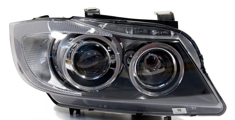 Strålkastare D1S/H7 höger sida komplett bi-xenon/ med adaptivt ljus - original Hella Tyskland 63117161672H BMW E90 E91